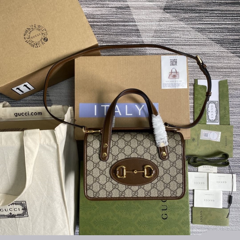 G*u*i top handle bags